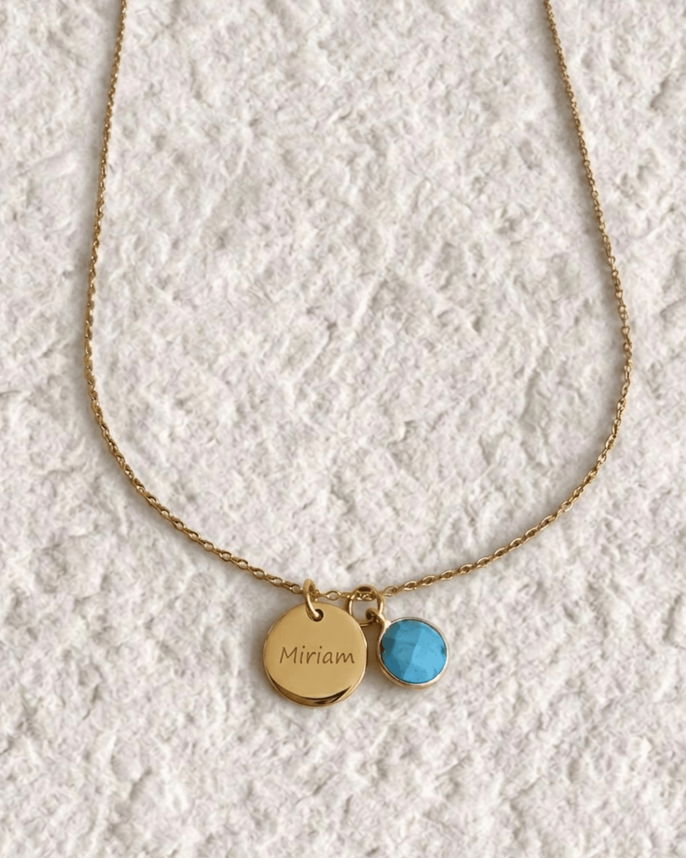 Necklace with engraved medal and natural stone