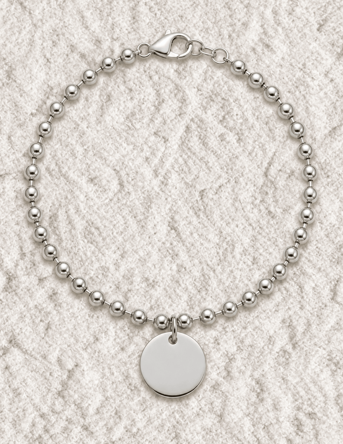 PULSERA PERLAS CON MEDALLA GRABADA