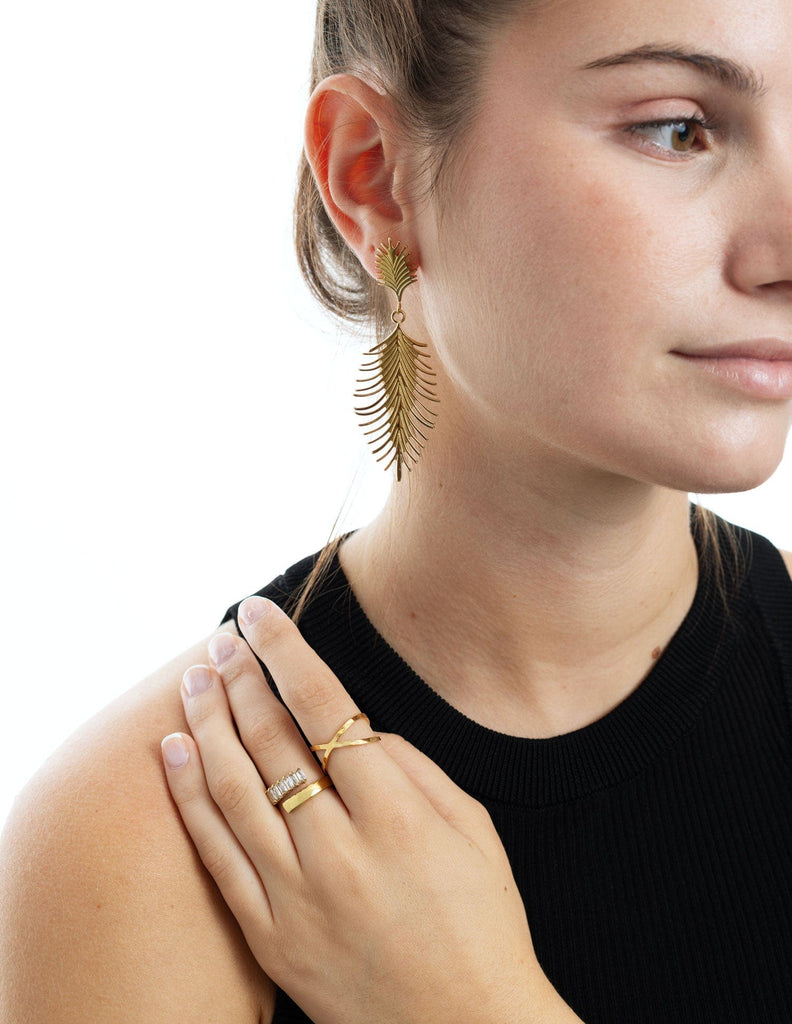 anillo con circonitas tipo baguette alargados ajustable dorado