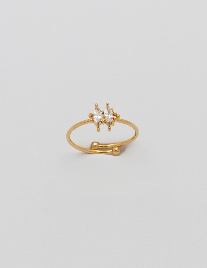 anillo fino ajustable dorado co dos circonitas ovaladas en el centro