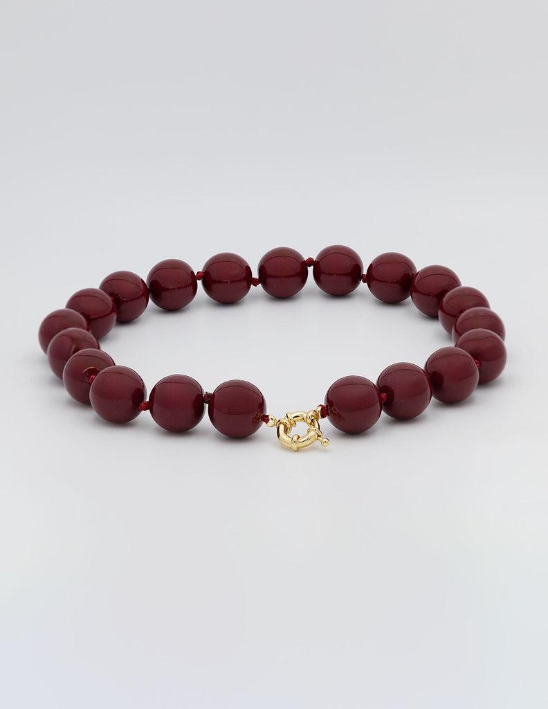 COLLAR BOLAS RESINA GRANATE