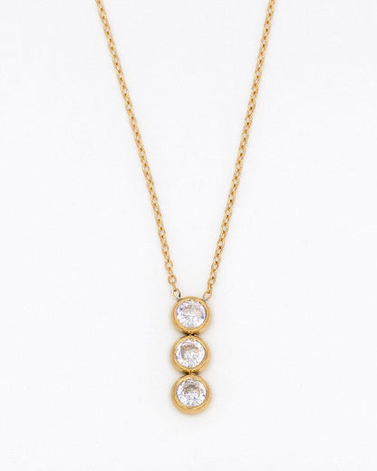 Collar dorado con 3 circonitas