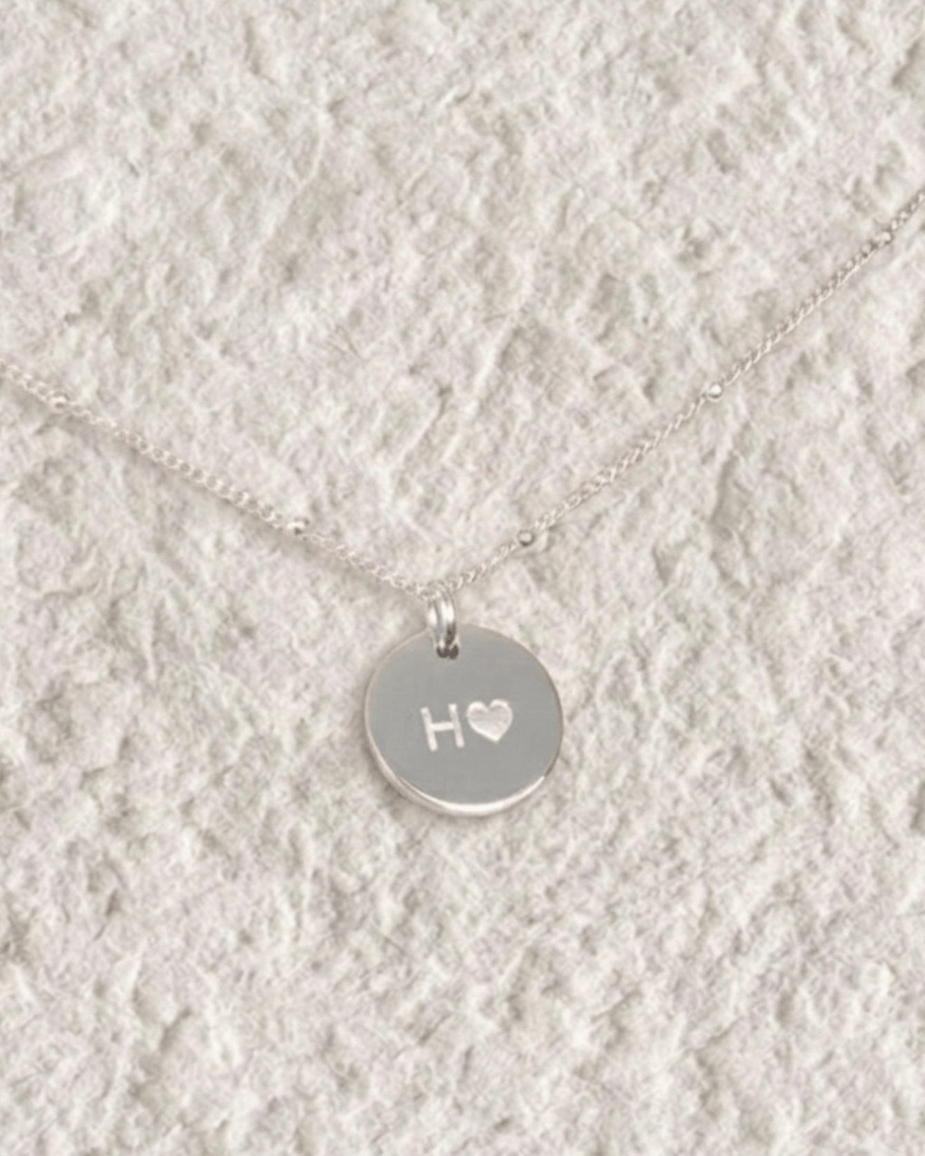 Rhombus necklace with engraved cubic zirconia