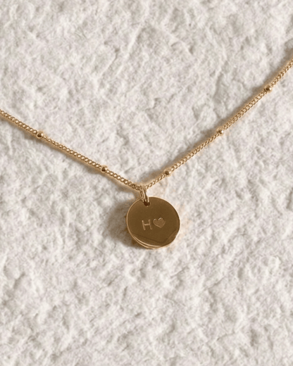 Rhombus necklace with engraved cubic zirconia