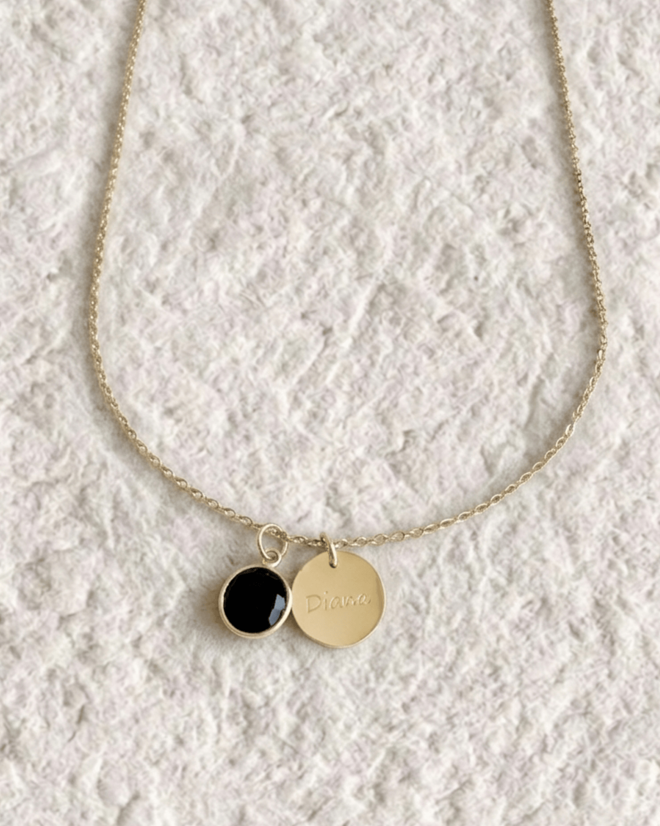 Necklace with engraved medal and natural stone