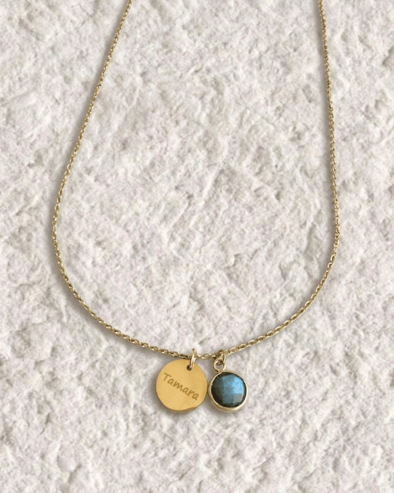 Necklace with engraved medal and natural stone