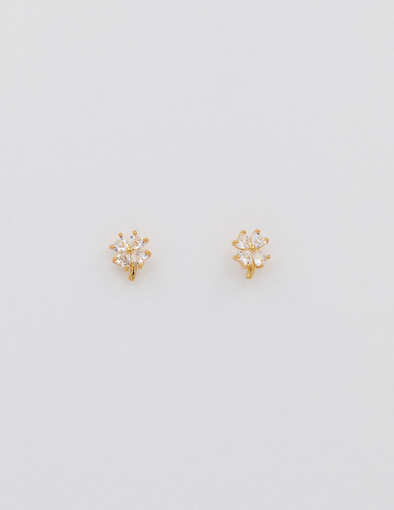 mini tréboles flor de brillantes circonitas de acero dorado con cierre de rosca