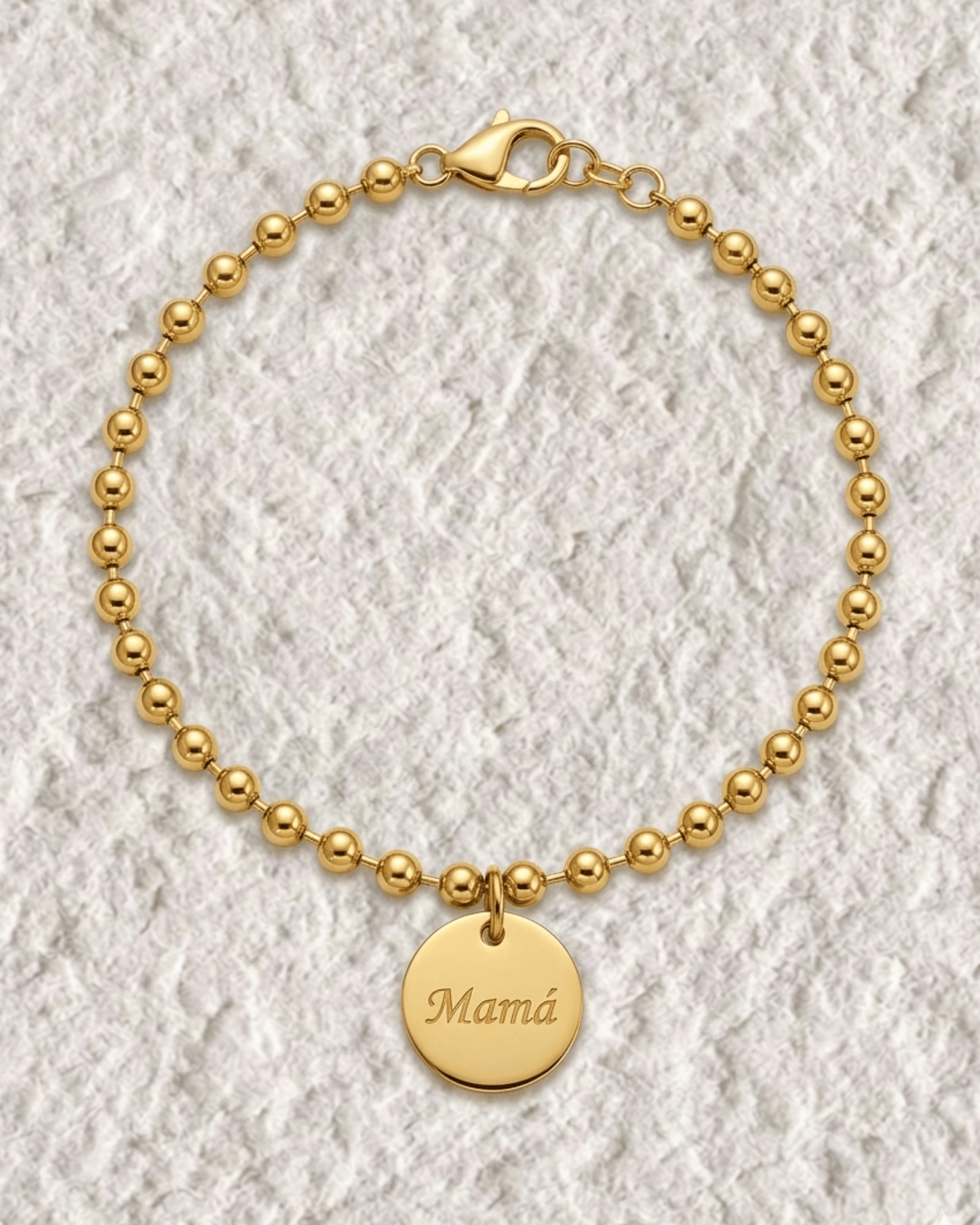 PULSERA CON MEDALLA GRABADA