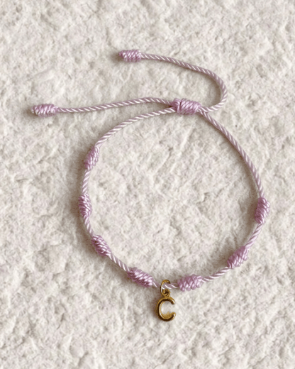 LUCKY KNOT BRACELET WITH ENGRAVED MEDAL