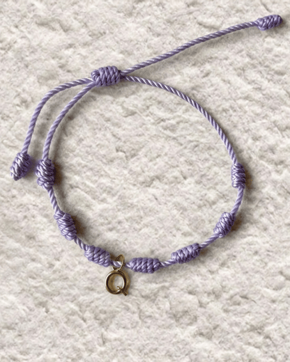 LUCKY KNOT BRACELET WITH ENGRAVED MEDAL