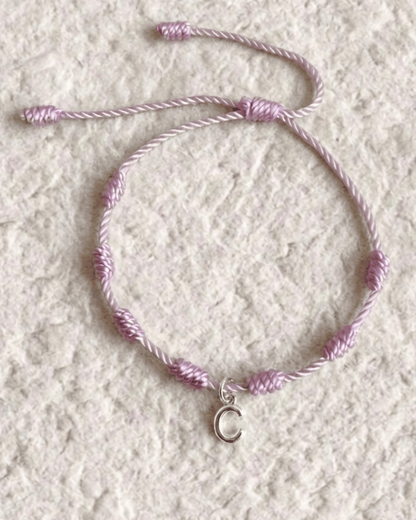 LUCKY KNOT BRACELET WITH ENGRAVED MEDAL