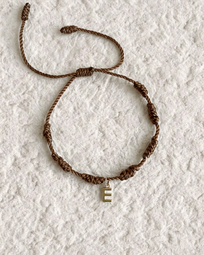 LUCKY KNOT BRACELET WITH ENGRAVED MEDAL