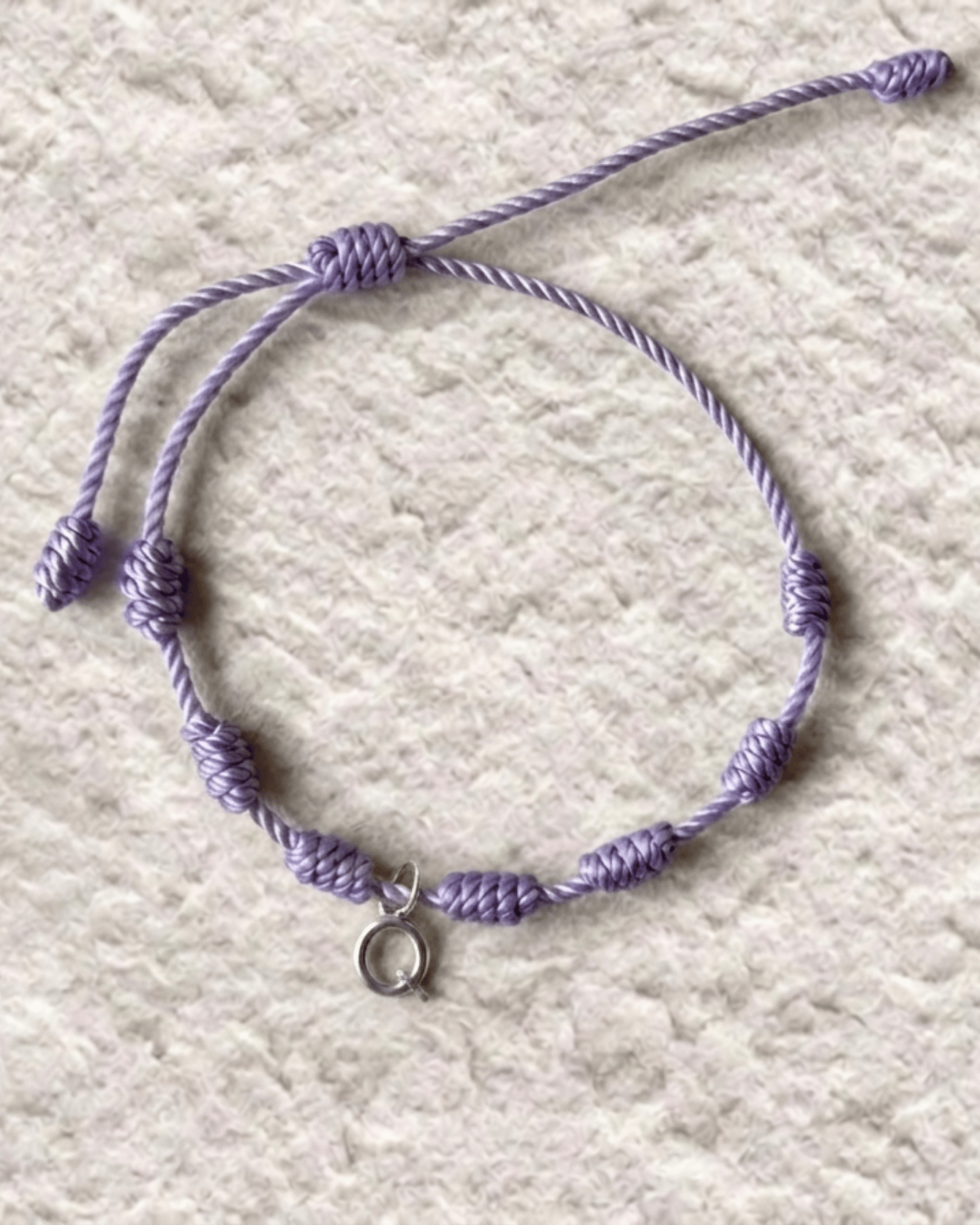LUCKY KNOT BRACELET WITH ENGRAVED MEDAL
