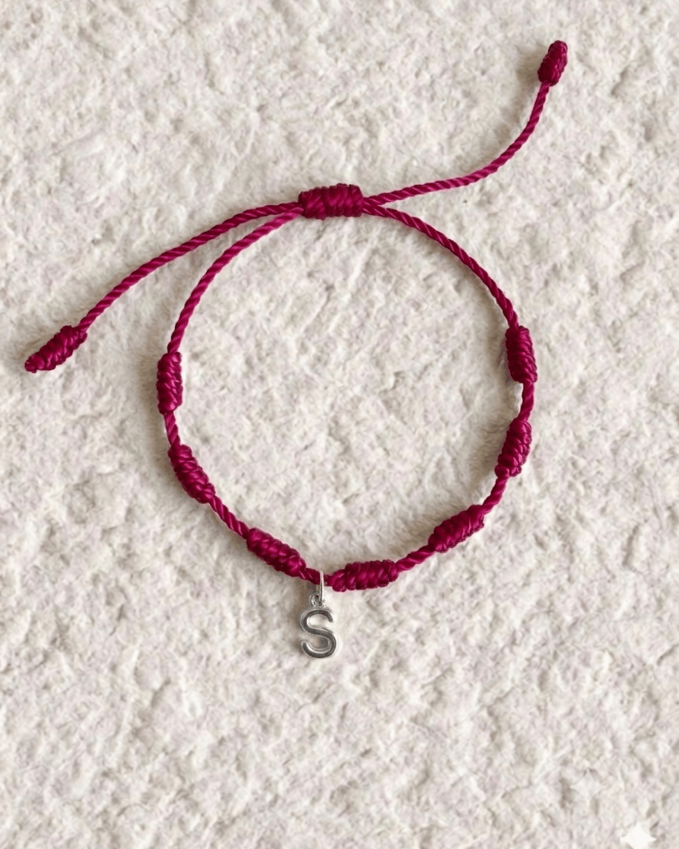 LUCKY KNOT BRACELET WITH ENGRAVED MEDAL