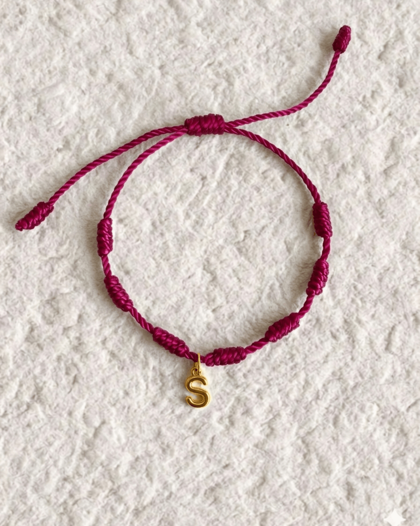 LUCKY KNOT BRACELET WITH ENGRAVED MEDAL
