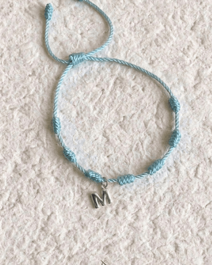 LUCKY KNOT BRACELET WITH ENGRAVED MEDAL