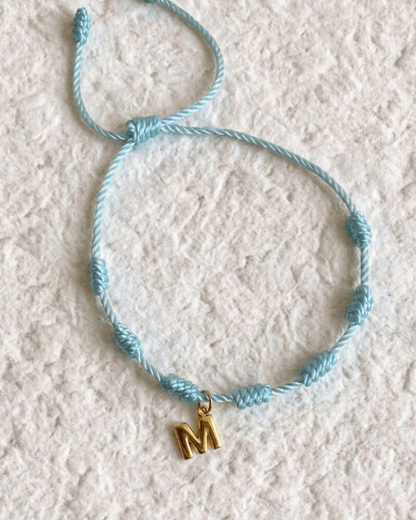 LUCKY KNOT BRACELET WITH ENGRAVED MEDAL