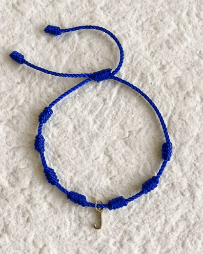 LUCKY KNOT BRACELET WITH ENGRAVED MEDAL