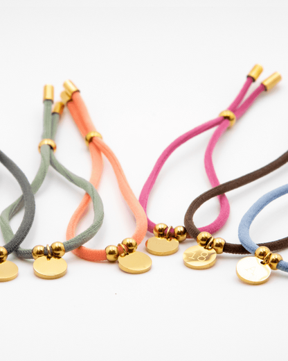 PULSERA ELÁSTICA CORDÓN CON MEDALLA PERSONALIZADA