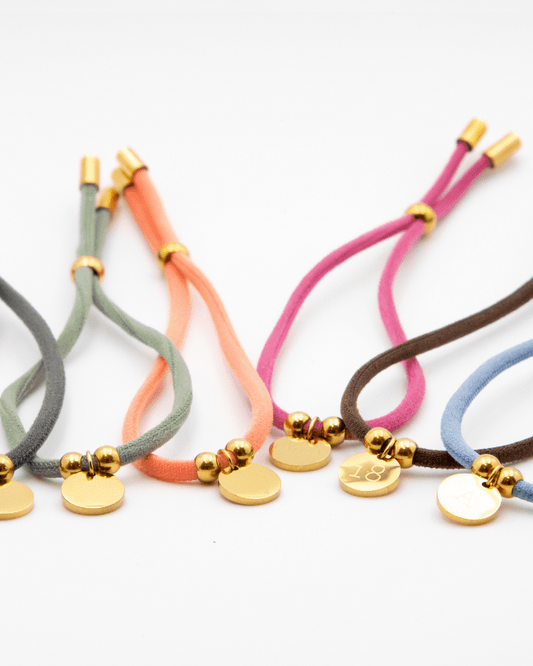 ELASTIC CORD BRACELET WITH PERSONALIZED MEDAL
