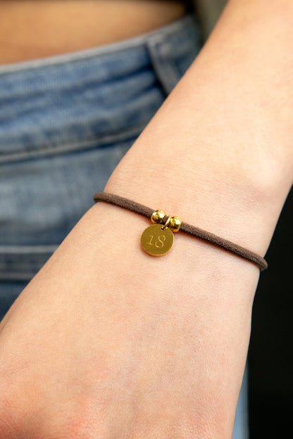 PULSERA ELÁSTICA CORDÓN CON MEDALLA PERSONALIZADA