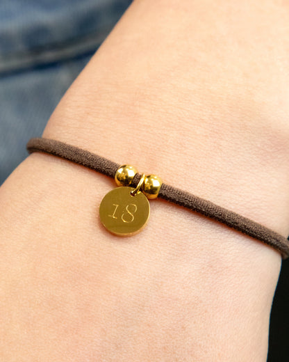 PULSERA ELÁSTICA CORDÓN CON MEDALLA PERSONALIZADA