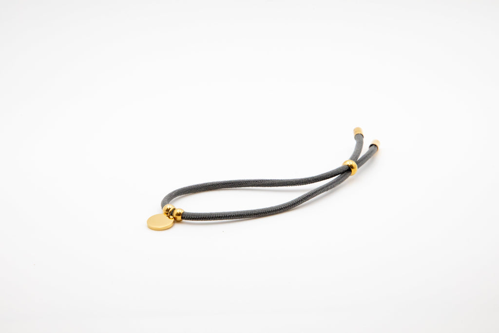 Pulsera elástica cordón con medalla personalizada
