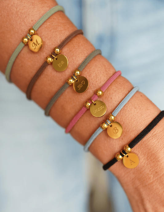 PULSERA ELÁSTICA CORDÓN CON MEDALLA PERSONALIZADA