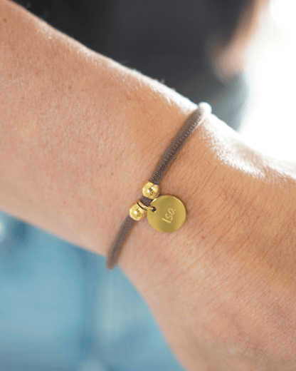 PULSERA ELÁSTICA CORDÓN CON MEDALLA PERSONALIZADA