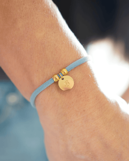 PULSERA ELÁSTICA CORDÓN CON MEDALLA PERSONALIZADA